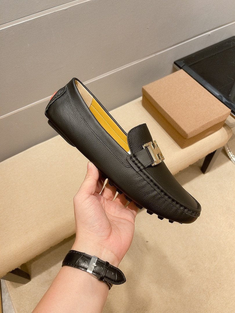 Hermès Black H-Accent Slip-On Loafers — side